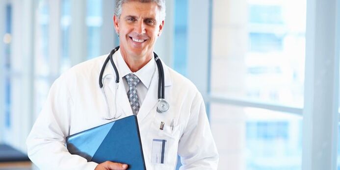 doctor treating nail fungus